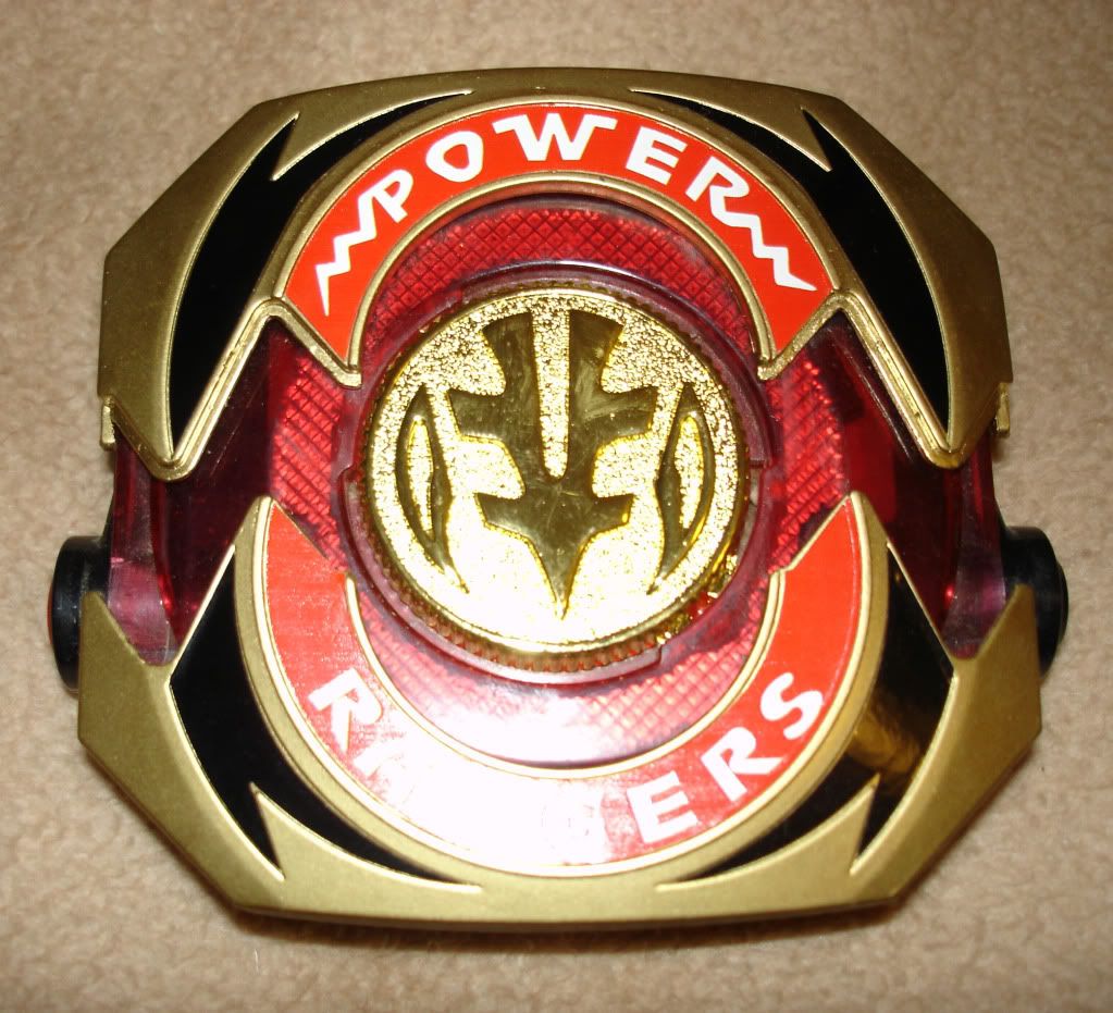 Jess's metal tigerzord coin in open morpher