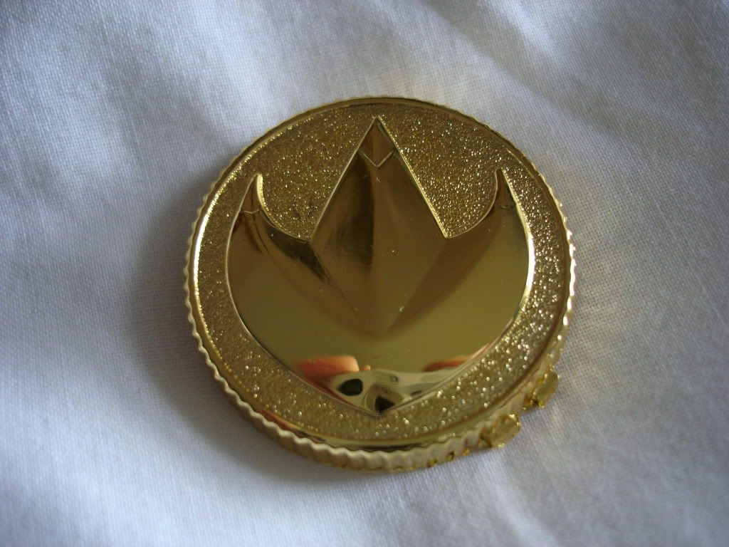 Starlight Studio's metal dragonzord coin front (so shiny!)