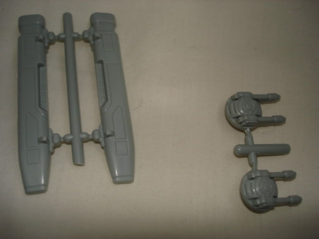 The blasters and rockets are still attached to their sprues