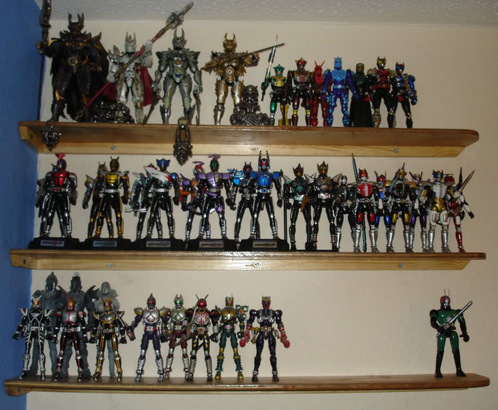 (Top Shelf) Garo Equip and Prop Collection, Miscellaneous Kamen Rider Den-O and Kiva SH Figures and Figuarts. (Middle Shelf) Kabuto SH Figures and Den-O SH Figures. (Bottom Shelf) Faiz SH Figures with RH Orphenocs, Blade SH Figures, Hibiki SH Figure and Saban's Masked Rider Figure.